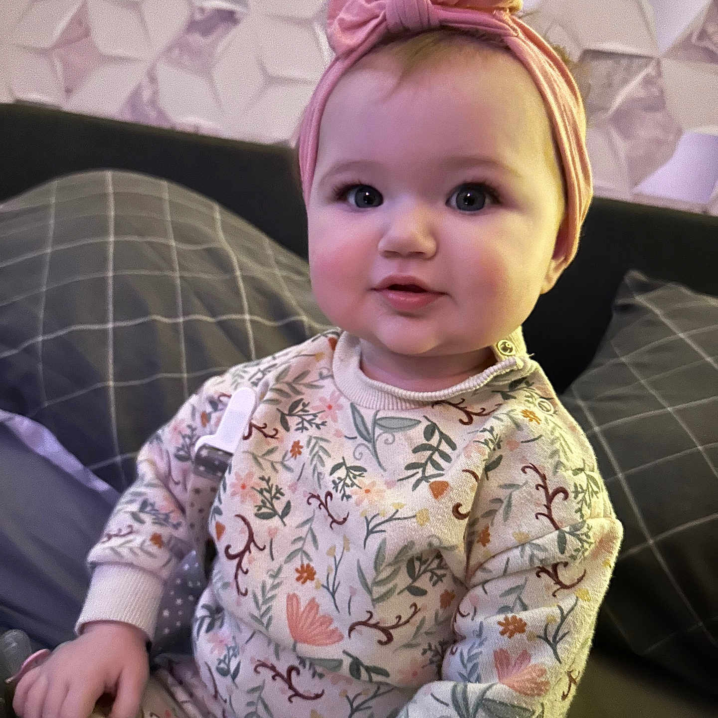 Aoife joined the competition — help win amazing prizes! accessories, architecture, baby, bonnet, building, cap, clothing, couch, cushion, face, furniture, hat, head, headband, homedecor, indoors, person, photography, portrait, sitting