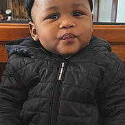 Kingston joined the competition — help win amazing prizes! toddler, child, baby, black_jacket, beanie, indoor, cute, pout, face, hands, warm_clothing, person, portrait, seated, expression, headwear, young_child, smile, cozy, casual