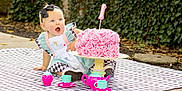 Addileyn is registered to the contest to win money with this photo: baby, child, girl, cake, pink, birthday, number_one, tea_set, outdoor, picnic_blanket, dress, headband, black_bow, happy, celebration, food, party, toy, smile, face