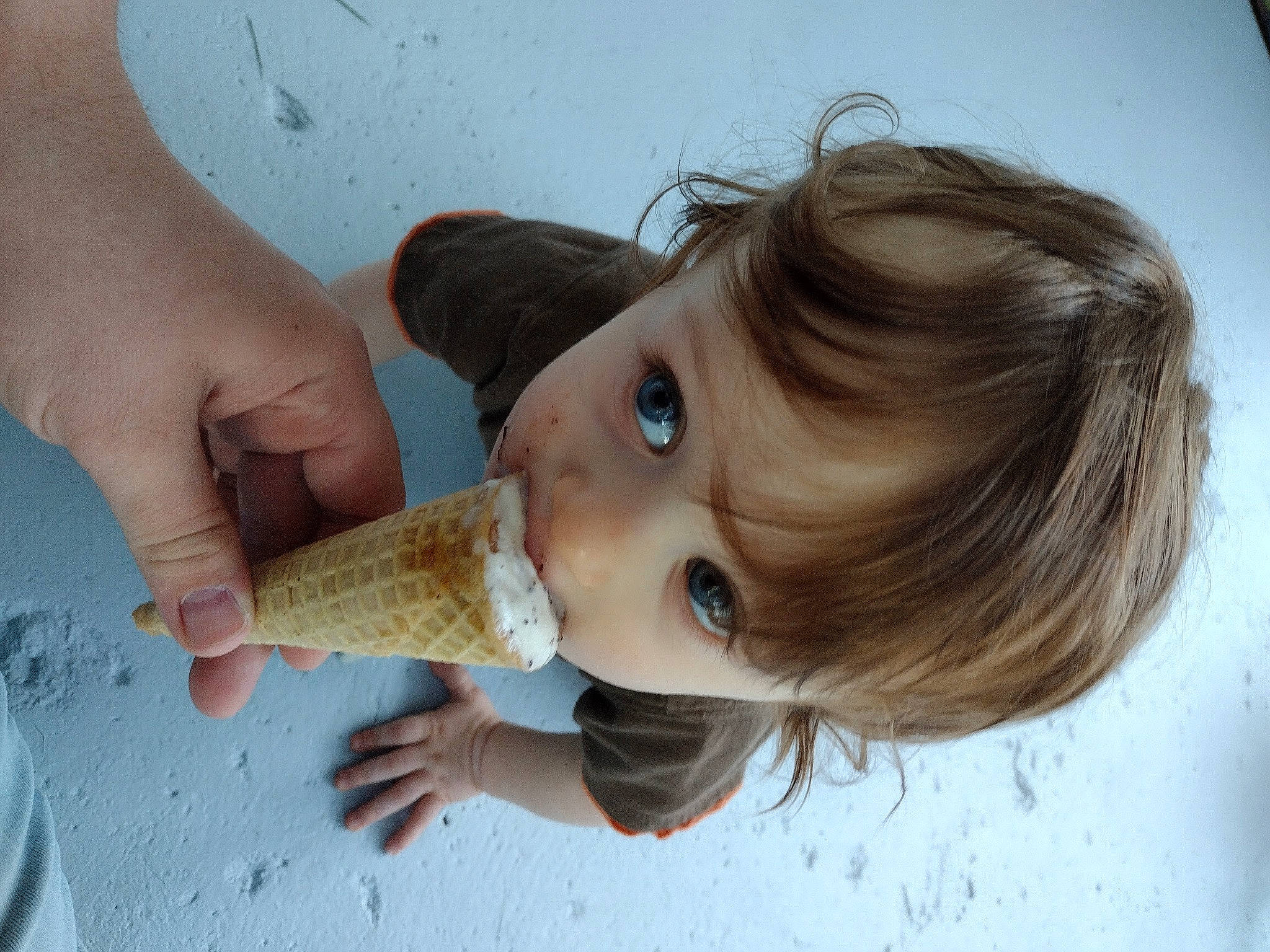 Jude is registered to the contest to win money with this photo: baby, blond, child, dress, drinking, elbow, eyelash, finger, food, fun, hair_coloring, hand, happy, ice_cream_cone, nail, person, portrait_photography, skin, toddler, vacation