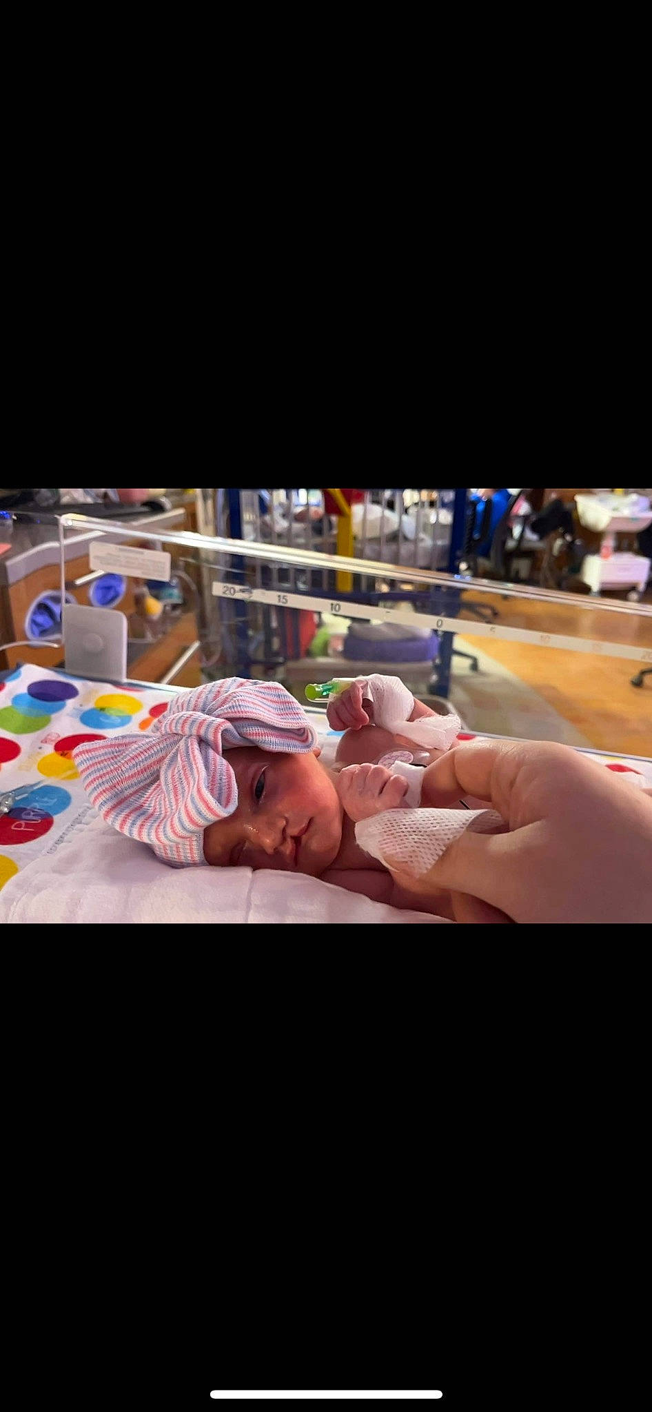 Harper is registered to the contest to win money with this photo: abdomen, baby, barechested, bed, bed_sheet, bedding, child, comfort, event, flesh, flooring, fun, headwear, human_leg, leisure, linens, nap, person, recreation, room