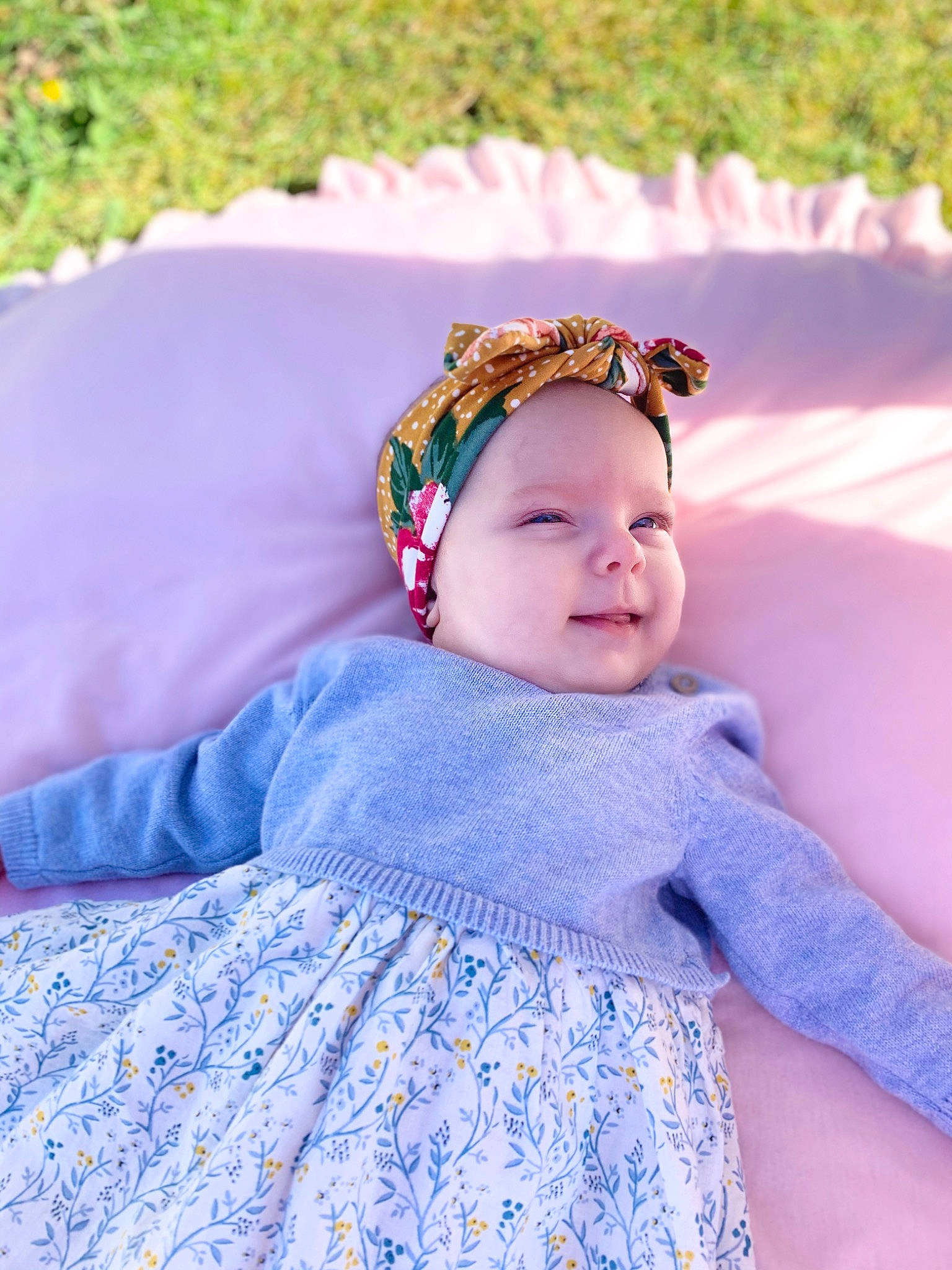 Remi joined the competition — help win amazing prizes! baby, baby_toddler_clothing, bonnet, child, crown, fashion_accessory, grass, hair_accessory, headband, headgear, pattern, person, photograph, photography, pink, skin, smile, toddler