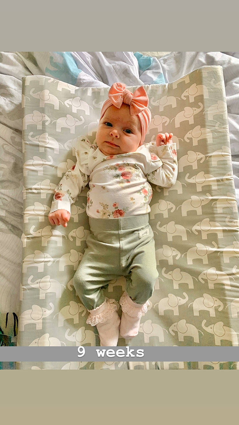 Remi is registered to the contest to win money with this photo: baby, baby_toddler_clothing, child, headwear, person, toddler