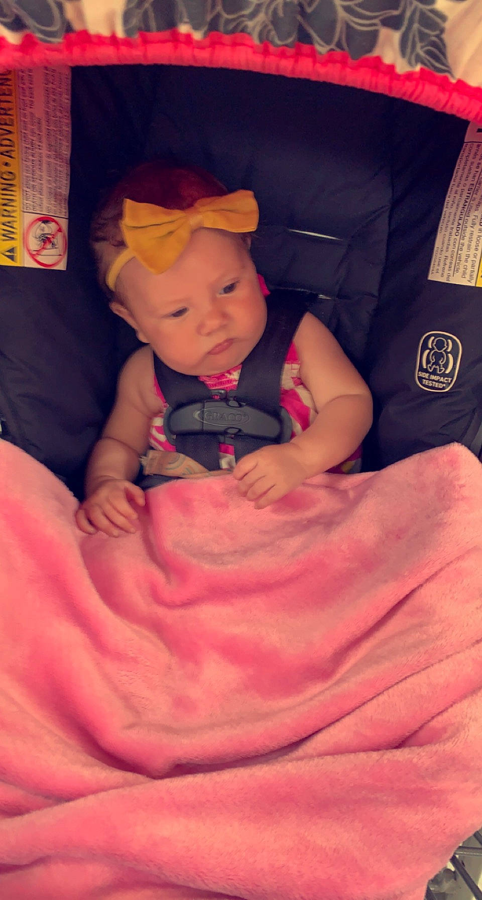 Emberlynn Willow is registered to the contest to win money with this photo: arm, baby, baby_toddler_clothing, cheek, chin, comfort, eye, finger, hand, hat, human_body, lap, magenta, person, pink, skin, sleeve, t_shirt, textile, thumb