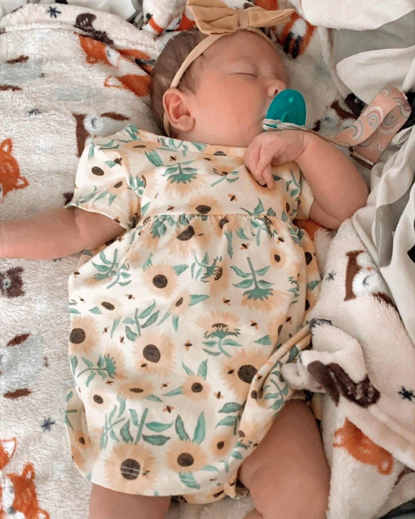 Emberlynn Willow joined the competition — help win amazing prizes! baby, baby_products, baby_safety, baby_sleeping, baby_toddler_clothing, child, comfort, human_body, infant_bodysuit, linens, muscle, pattern, person, pink, skin, sleeve, textile, thigh, toddler, toy