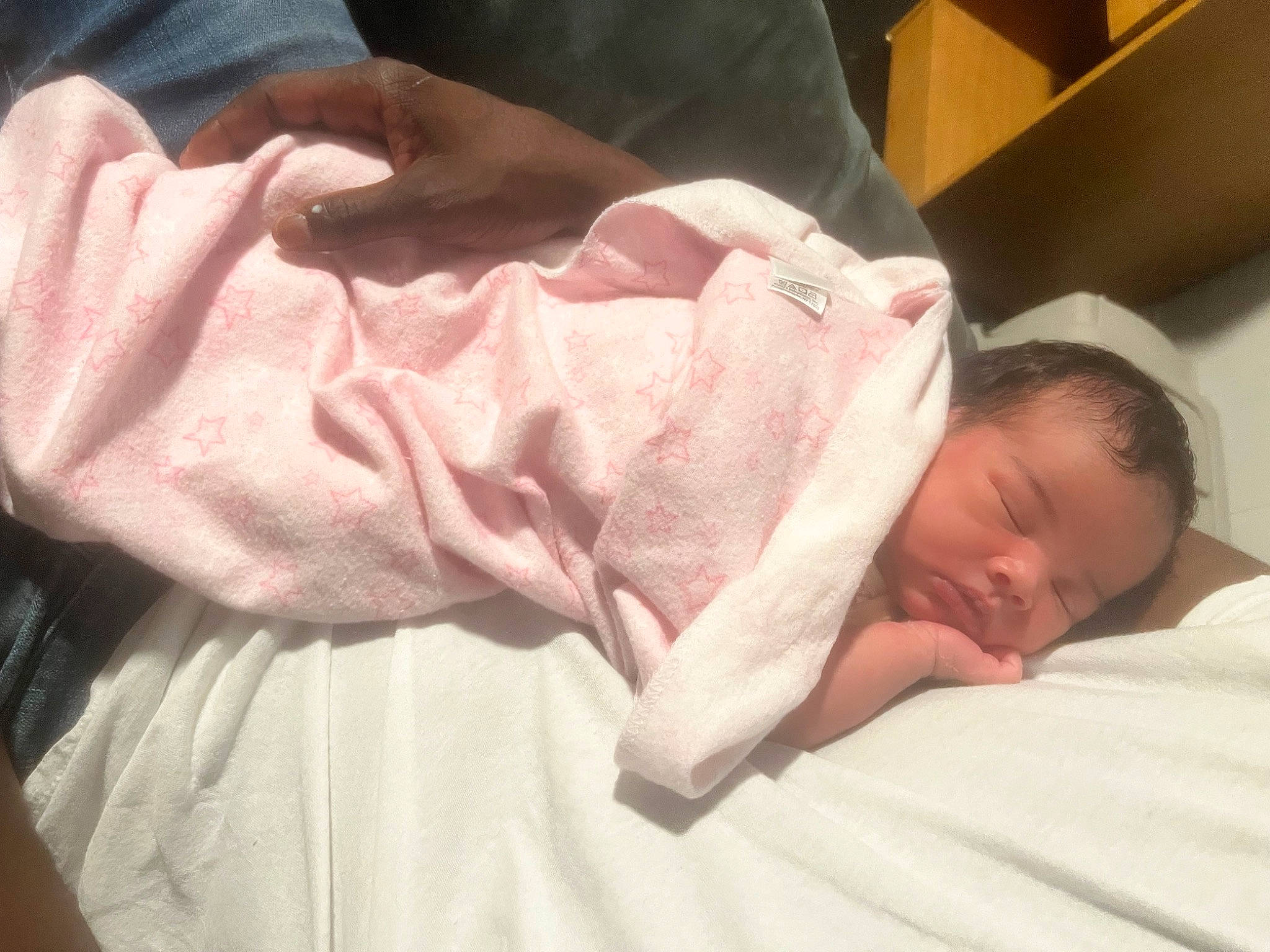 Alaina is registered to the contest to win money with this photo: baby, baby_products, baby_sleeping, baby_toddler_clothing, bedding, bedtime, child, childbirth, comfort, event, flesh, gesture, hospital, linens, nap, person, skin, sleep, sleeve, thumb