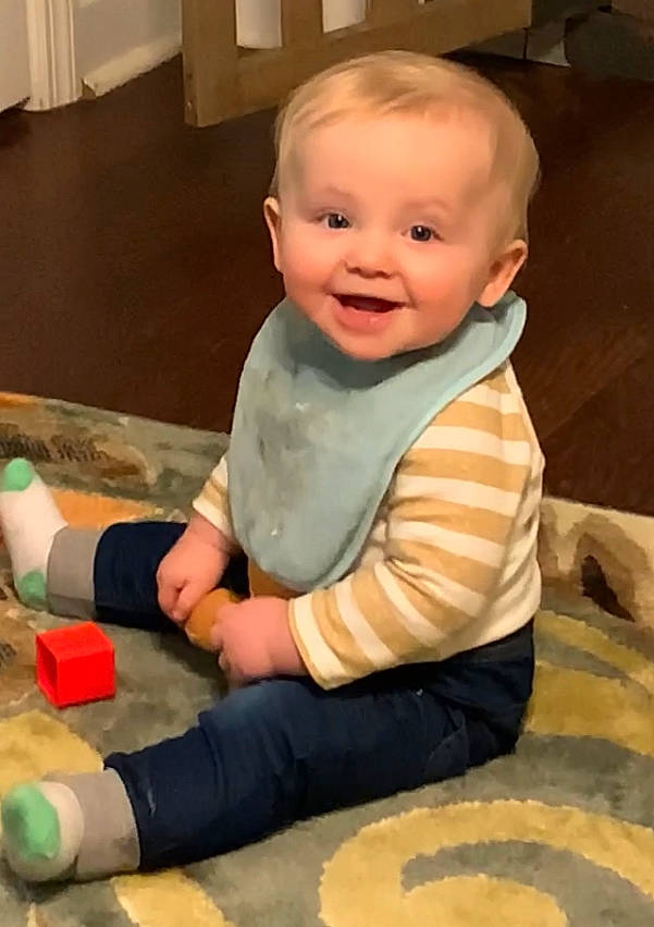 Rush joined the competition — help win amazing prizes! baby, baby_toddler_clothing, cheek, child, comfort, finger, floor, flooring, fun, hardwood, joy, person, room, sitting, skin, sleeve, smile, thumb, toddler, varnish