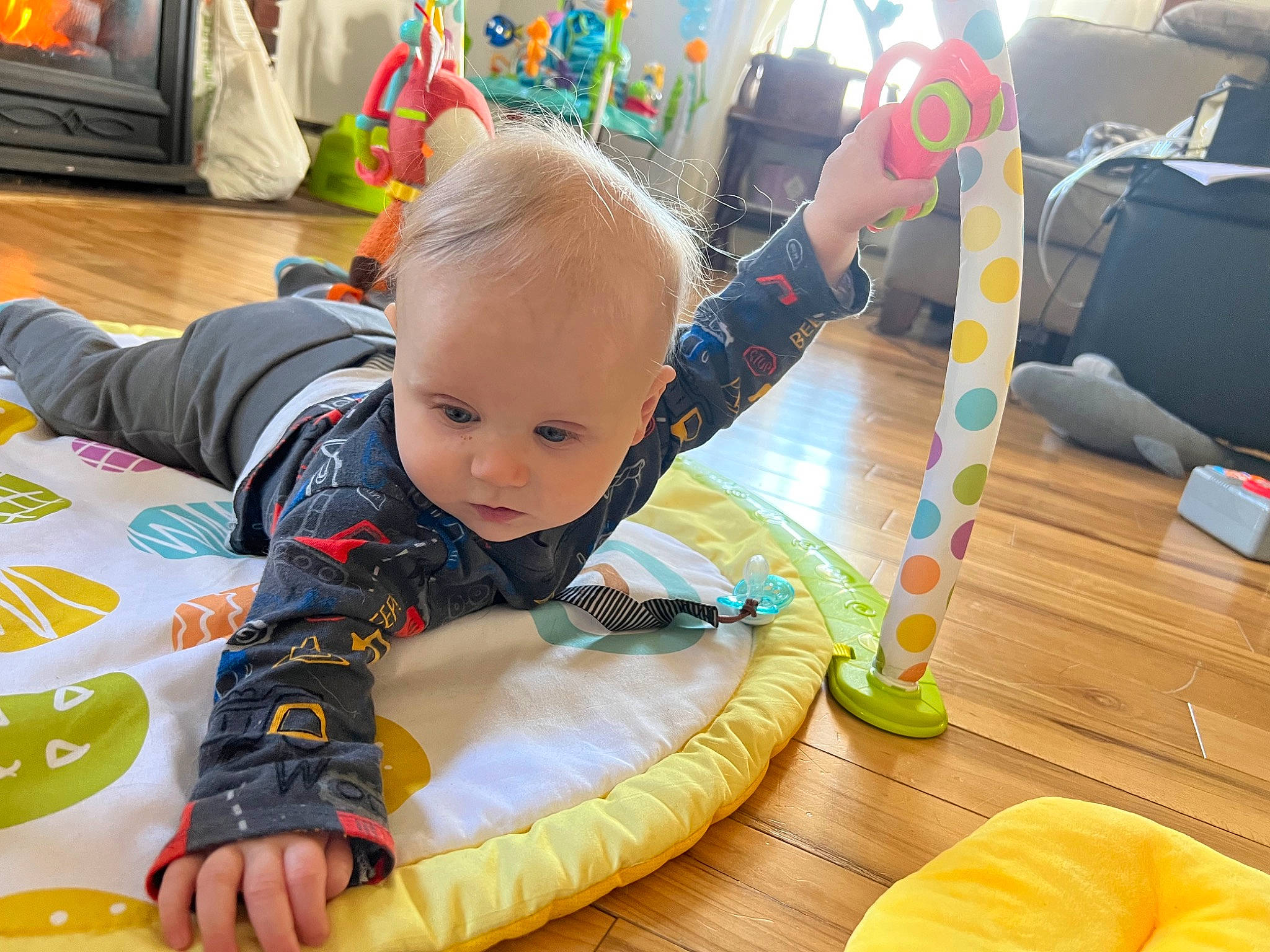 Leo joined the competition — help win amazing prizes! baby, baby_playing_with_toys, baby_products, baby_toddler_clothing, baby_toys, child, comfort, event, flooring, fun, hardwood, leisure, orange, person, play, room, sitting, toddler, toy, wood