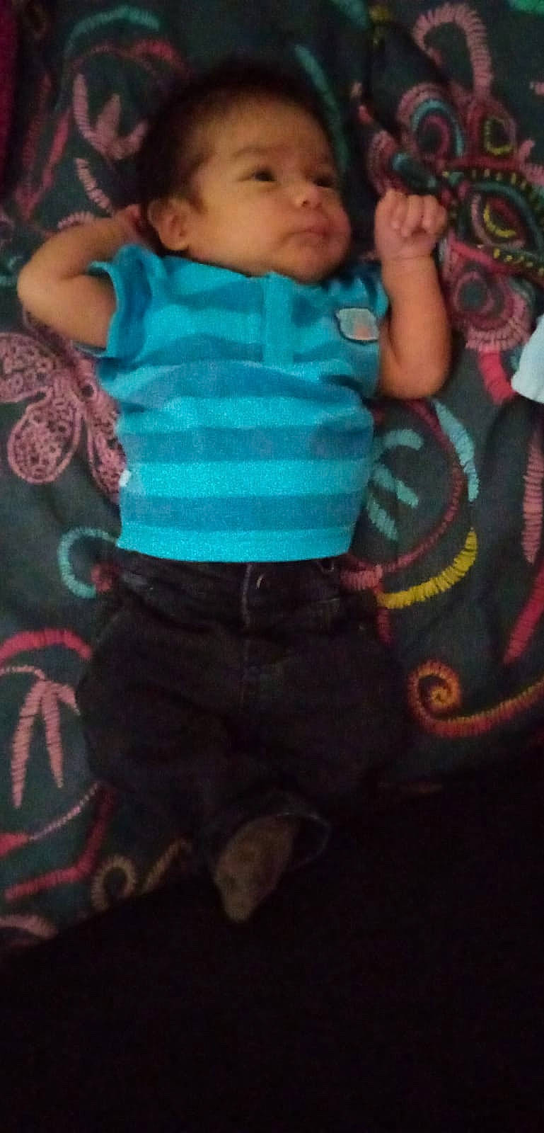 Tomás participe au concours pour gagner de l'argent avec cette photo : arm, baby, cheek, child, cool, hand, head, person, pink, play, product, sitting, skin, sleep, smile, textile, toddler, turquoise