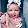 Lolie a rejoint le concours — aidez-le/la à gagner de superbes lots ! baby, smiling, blue_eyes, headband, bow, plush_toy, pacifier, pink_blanket, cushioned_seat, infant, cute, happy, child, portrait, closeup, soft_toys, indoors, cozy, clothing, face