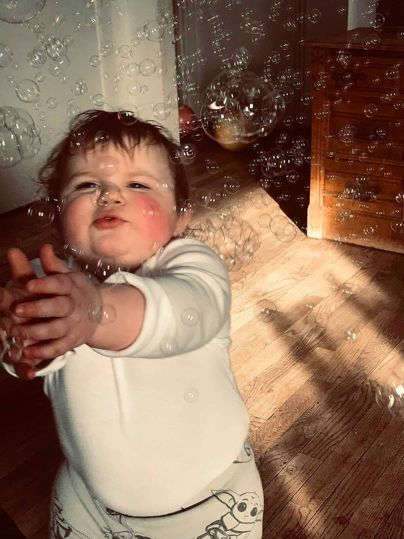 Maggie is registered to the contest to win money with this photo: abdomen, baby, baby_toddler_clothing, cheek, chest, child, cool, event, flash_photography, fun, gesture, happy, navel, nose, person, sitting, thumb, toddler, trunk, water