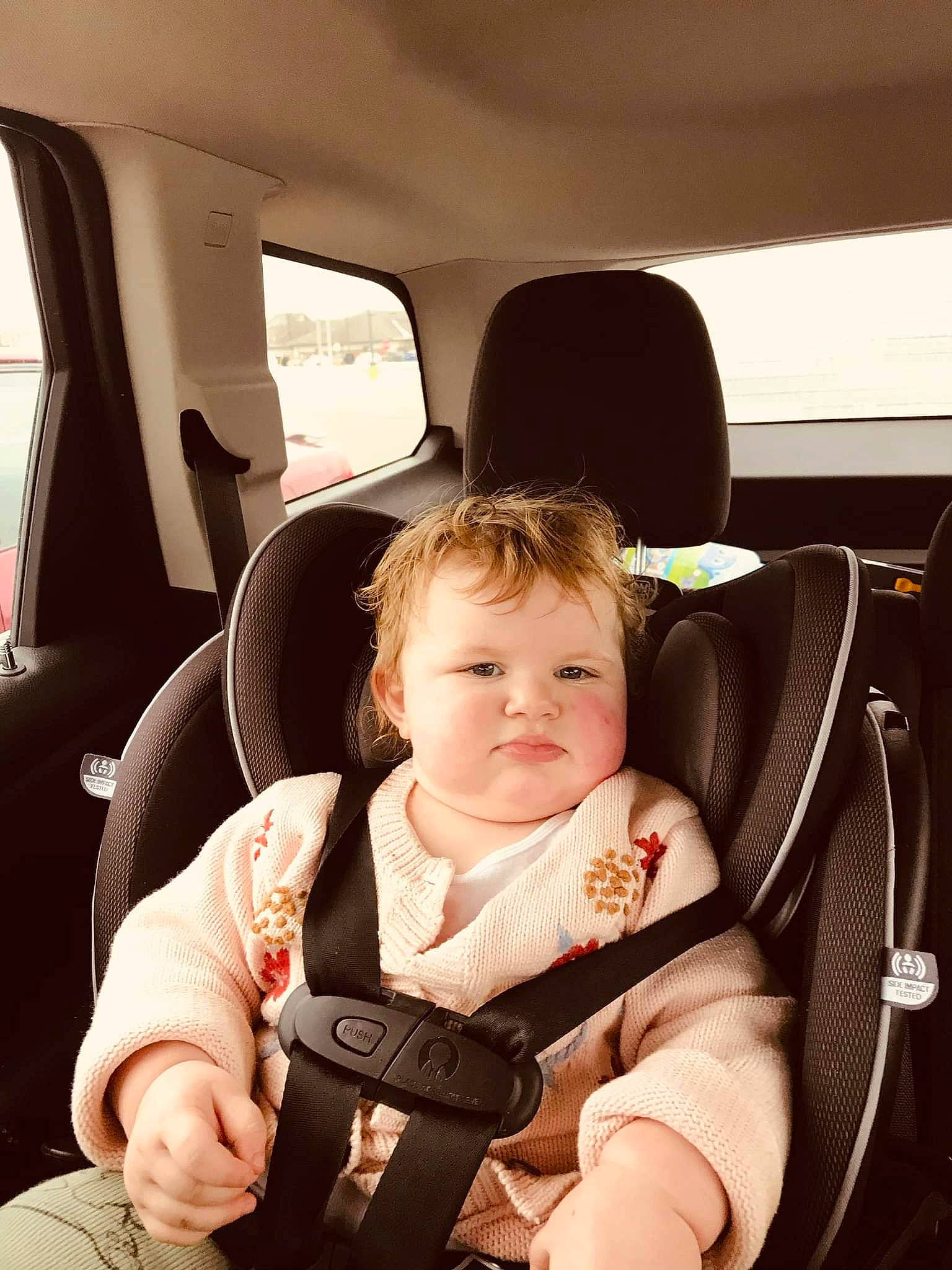 Maggie joined the competition — help win amazing prizes! auto_part, automotive_design, baby, baby_in_car_seat, car, car_seat, car_seat_cover, child, comfort, family_car, head_restraint, motor_vehicle, person, seat_belt, steering_part, steering_wheel, toddler, vehicle, vehicle_door, white