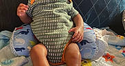 Treyvion joined the competition — help win amazing prizes! animal_print, baby, blanket, child, clothing, colorful, cozy, cushion, cute, indoor, infant, lion, onesie, pattern, portrait, relaxed, resting, socks, soft_toys, young