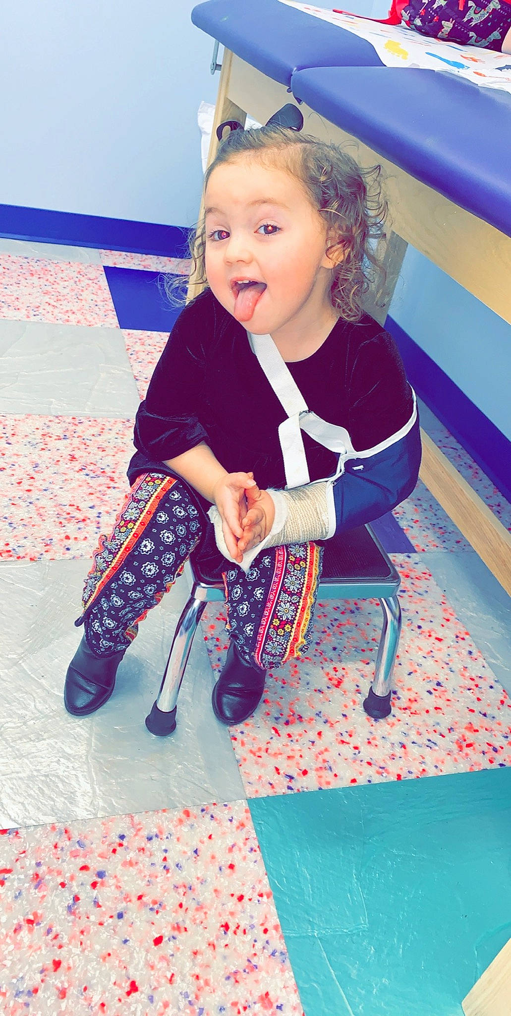 Vada is registered to the contest to win money with this photo: baby, child, child_model, facial_expression, footwear, happy, leg, pattern, person, play, shoe, sitting, smile, surprise, textile, toddler