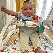 Solana joined the competition — help win amazing prizes! baby, infant, walker, smiling, happy, playful, indoor, curtains, yellow_curtains, footwear_free, clothing, toy, colorful, person, child, cute, legs, feet, table, home