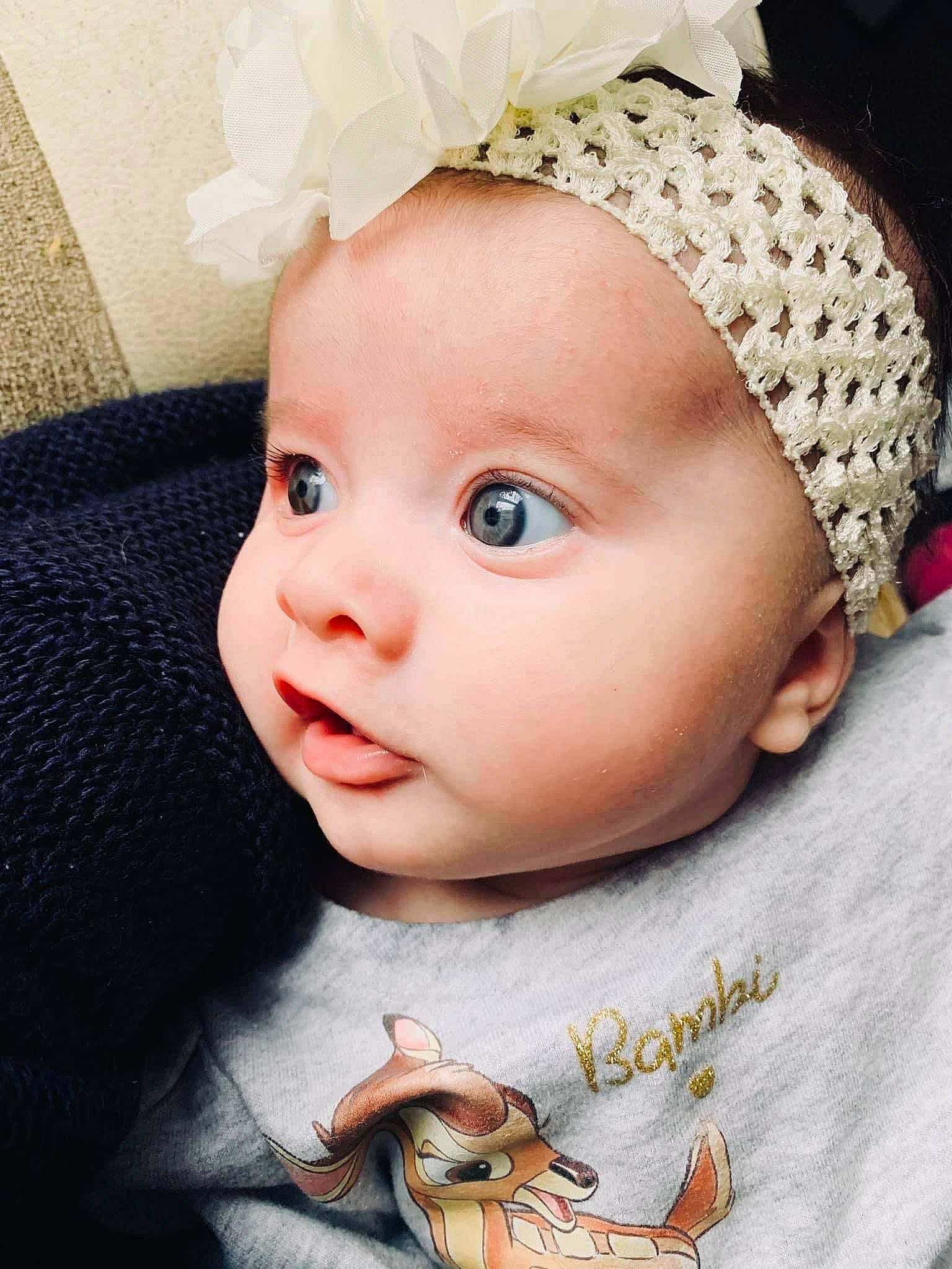 Rose participe au concours pour gagner de l'argent avec cette photo : baby, baby_toddler_clothing, cap, cheek, chin, ear, eye, eyebrow, eyelash, head, iris, lip, neck, nose, outerwear, person, product, skin, sleeve, textile