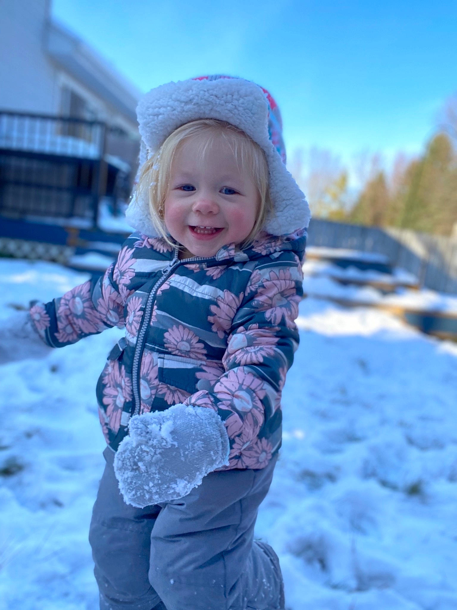 Brexley is registered to the contest to win money with this photo: baby, bonnet, child, freezing, fun, joy, knit_cap, outerwear, pattern, person, photography, play, playing_in_the_snow, skin, smile, snow, toddler, winter