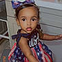 toddler, child, dress, bow, patriotic, stars, stripes, kitchen, cabinet, countertop, earrings, curious, arms, indoor, person, clothing, young_child, girl, portrait, fashion