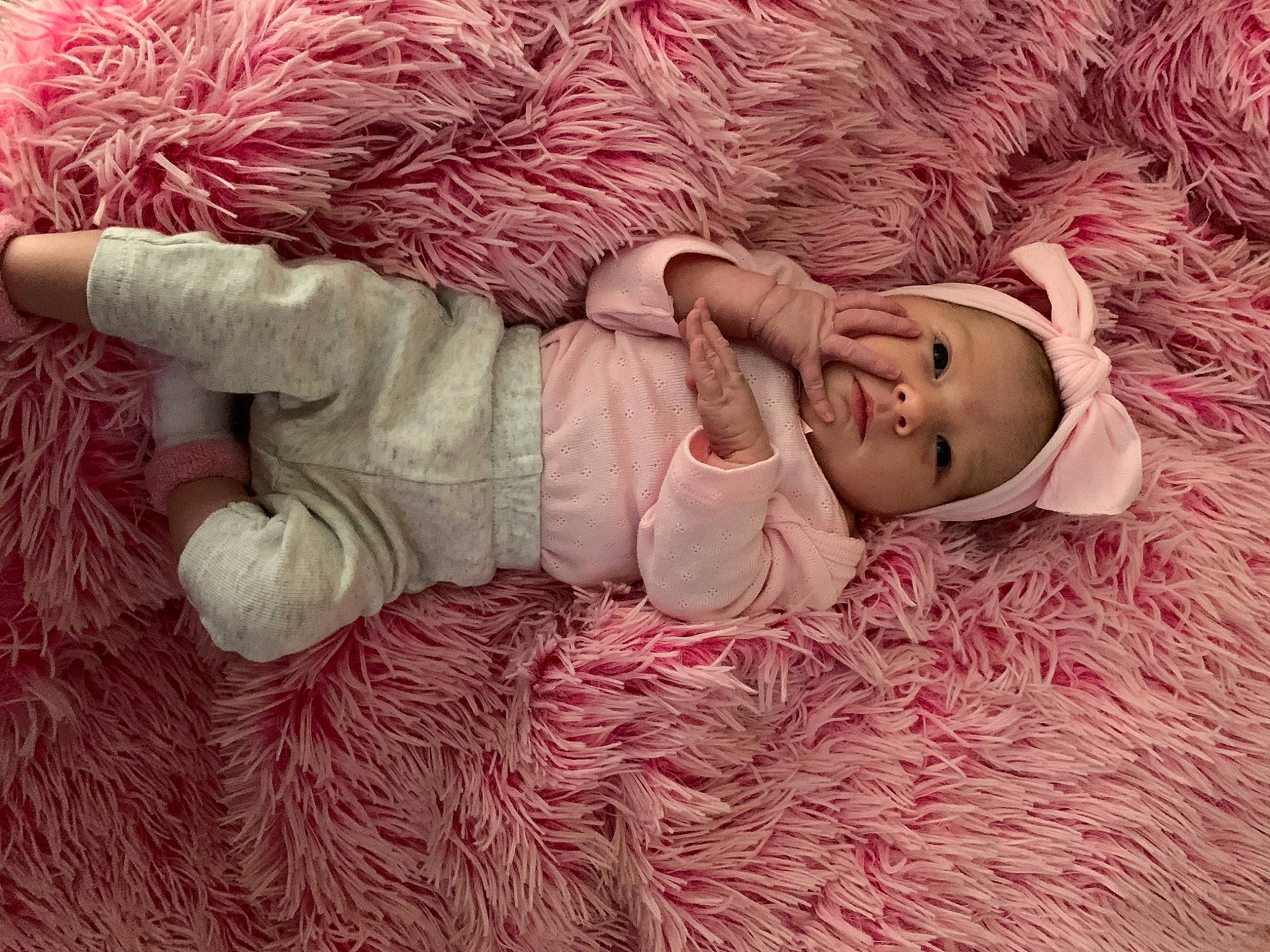 Sofie joined the competition — help win amazing prizes! arm, baby, baby_sleeping, baby_toddler_clothing, bed, bedding, comfort, dress, eye, finger, hair, head, headgear, human_body, leg, linens, person, pink, sleeve, textile