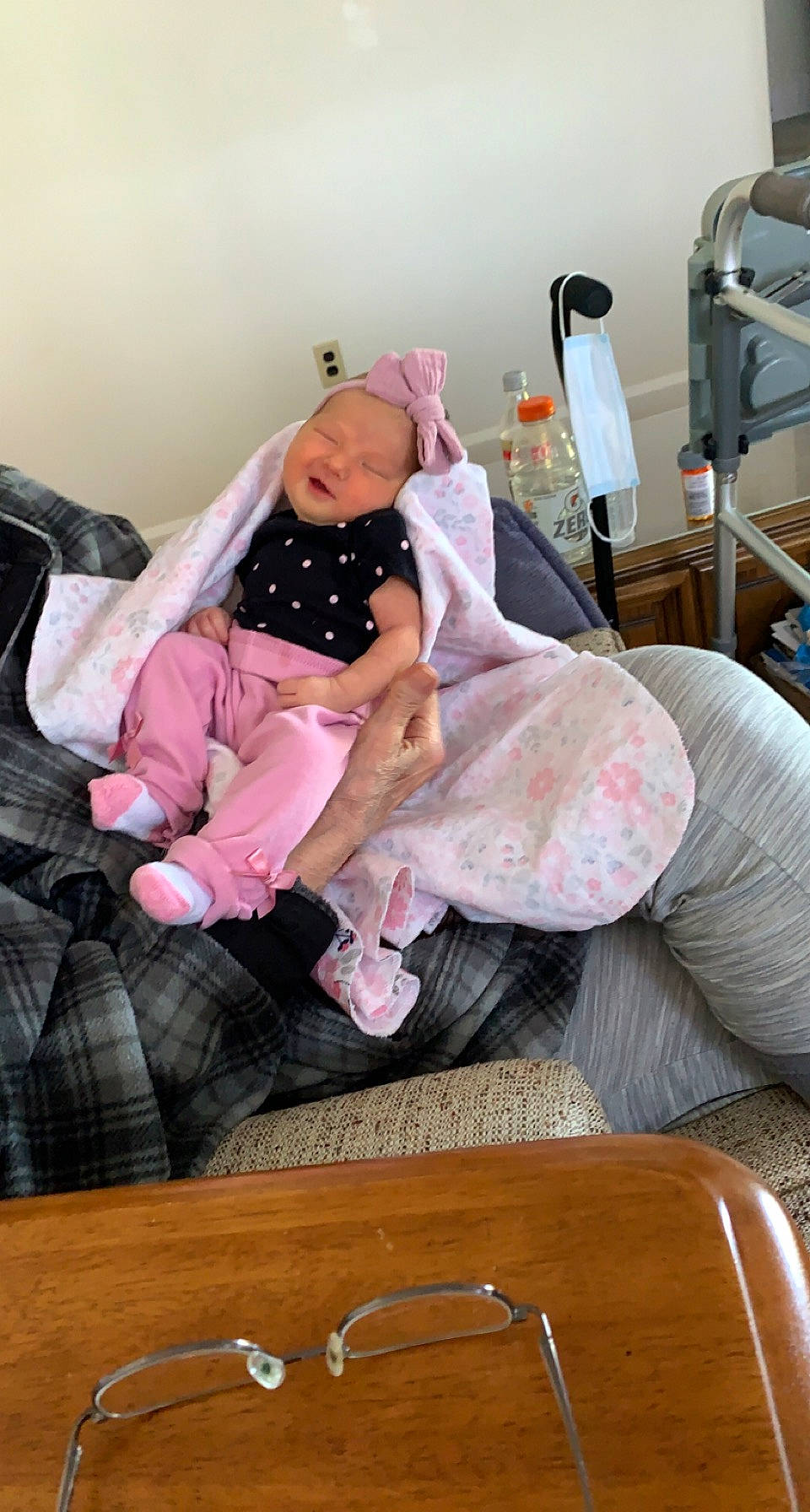 Sofie is registered to the contest to win money with this photo: baby, baby_products, baby_toddler_clothing, bag, child, comfort, fun, hardwood, leisure, linens, magenta, person, pink, purple, room, sitting, sock, t_shirt, textile, toddler