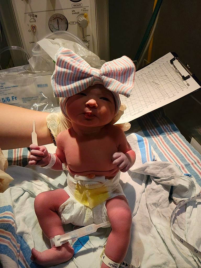 Sofie joined the competition — help win amazing prizes! baby, baby_toddler_clothing, cap, comfort, diaper, finger, fun, hand, hat, headgear, headwear, human_leg, mouth, person, shorts, skin, smile, sun_hat, thigh, thumb