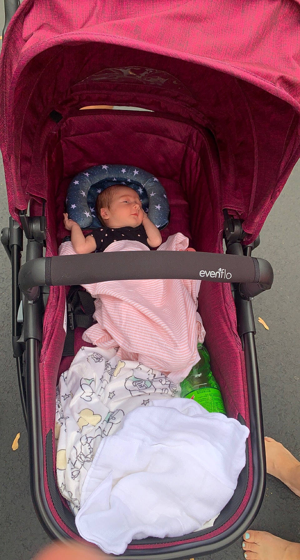 Sofie is registered to the contest to win money with this photo: auto_part, baby, baby_carriage, baby_products, baby_toddler_clothing, child, comfort, fun, leisure, magenta, motor_vehicle, person, pink, product, sitting, toddler, vacation