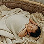 Lorenzo is registered to the contest to win money with this photo: newborn, baby, sleeping, blanket, bassinet, woven, cozy, soft, infant, rest, peaceful, cream, fabric, texture, nursery, child, cute, relaxation, indoors, portrait