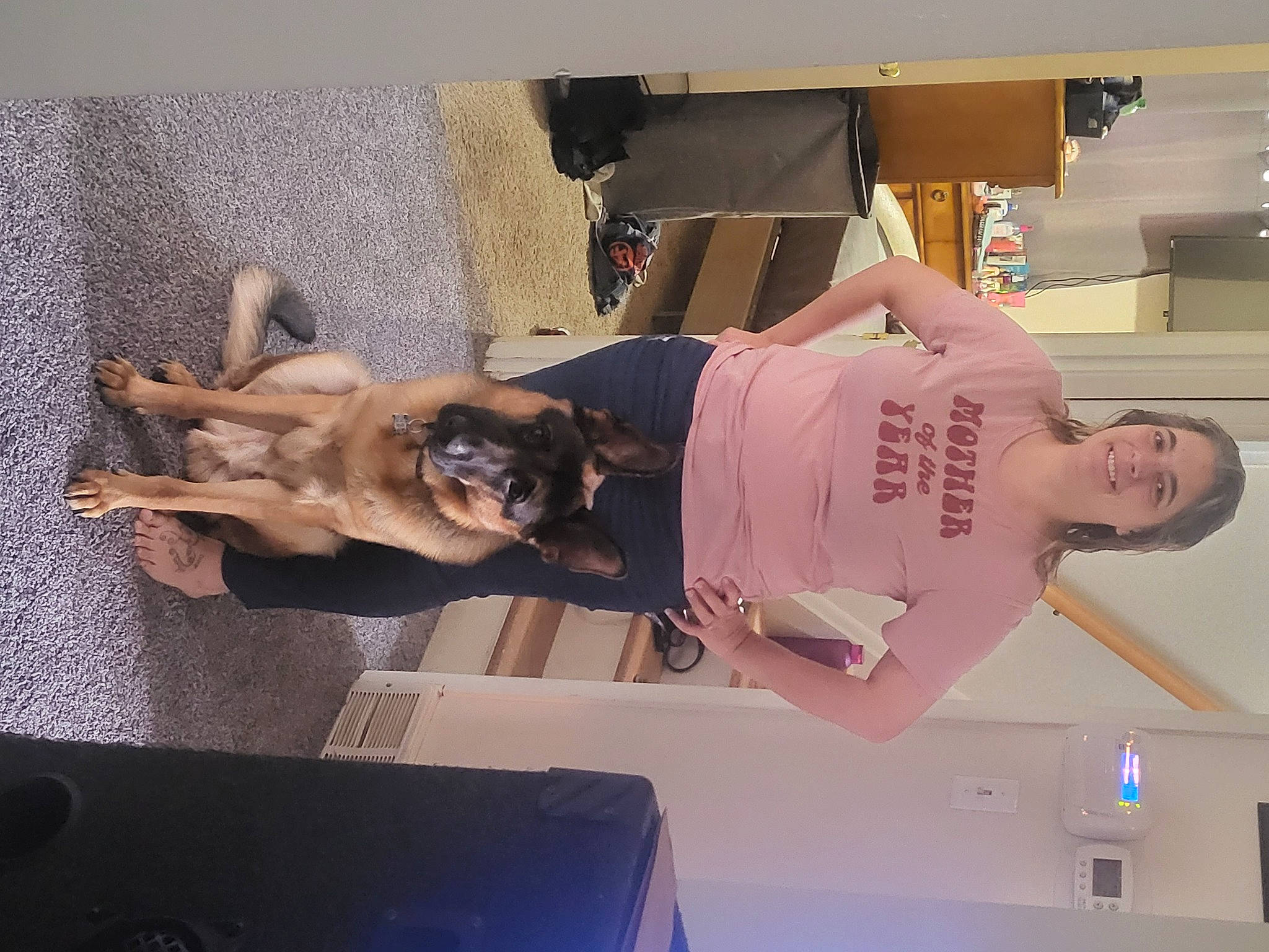 Diesel joined the competition — help win amazing prizes! carnivore, comfort, companion_dog, display_device, dog, dog_breed, elbow, flooring, human_leg, room, t_shirt, thigh, toy_dog, working_animal, wrist