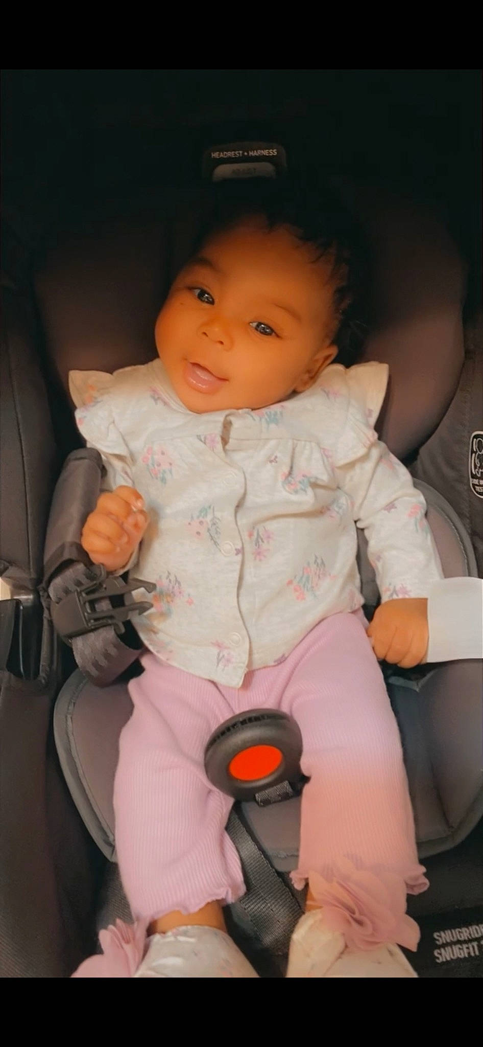 Marlee is registered to the contest to win money with this photo: arm, baby, baby_carriage, baby_toddler_clothing, car_seat, chair, cheek, child, comfort, finger, hand, knee, lap, lip, person, skin, smile, sock, thigh, thumb