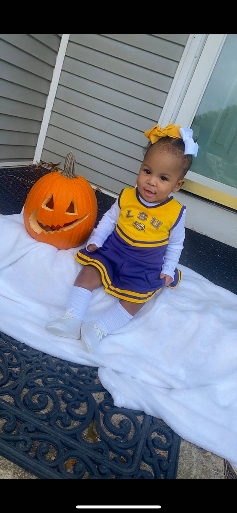 Marlee joined the competition — help win amazing prizes! baby, baby_toddler_clothing, black, calabaza, child, dress, eye, floor, flooring, fun, gourd, happy, head, orange, person, pumpkin, purple, t_shirt, toddler, winter_squash