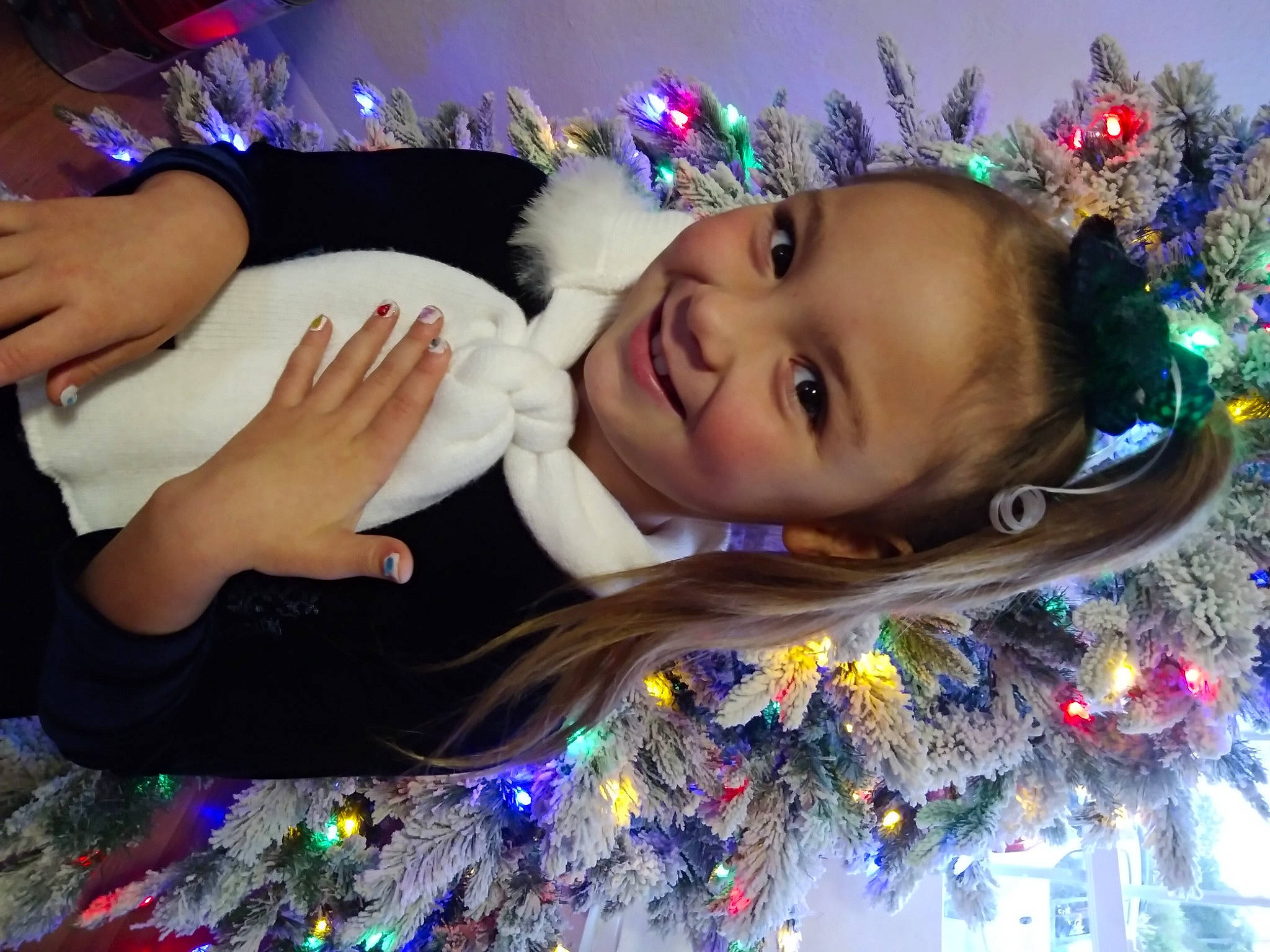 Casey is registered to the contest to win money with this photo: beauty, christmas_decoration, christmas_ornament, christmas_tree, electric_blue, fun, happy, iris, joy, leisure, light, lighting, ornament, people, person, photograph, plant, purple, smile, snapshot