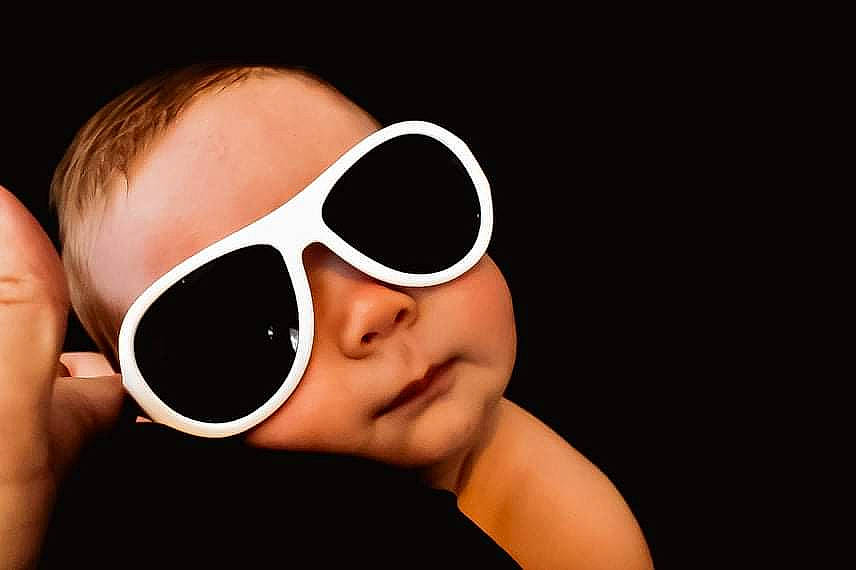 Brock is registered to the contest to win money with this photo: audio_equipment, black_hair, cheek, drinkware, eye_glass_accessory, eyebrow, eyelash, eyewear, flash_photography, gesture, glasses, happy, human_body, lip, mouth, neck, nose, person, smile, sunglasses