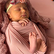 Ariana participe au concours pour gagner de l'argent avec cette photo : newborn, baby, sleeping, wrapped, pink, blanket, headband, flower, infant, peaceful, hands, feet, soft, cozy, portrait, cute, child, closeup, resting, indoors