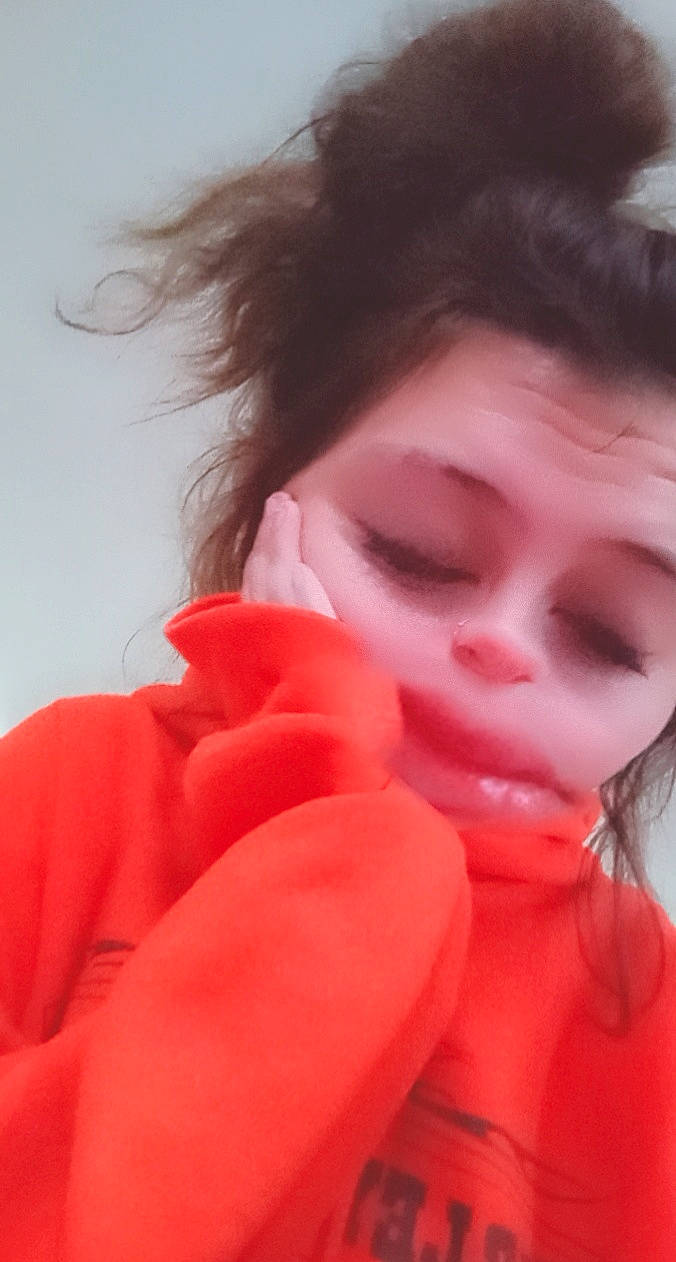 Kiera is registered to the contest to win money with this photo: brown_hair, cheek, chin, electric_blue, eyebrow, eyelash, fashion_accessory, fur, gesture, happy, jaw, lip, lipstick, magenta, mouth, neck, nose, person, petal, shoulder