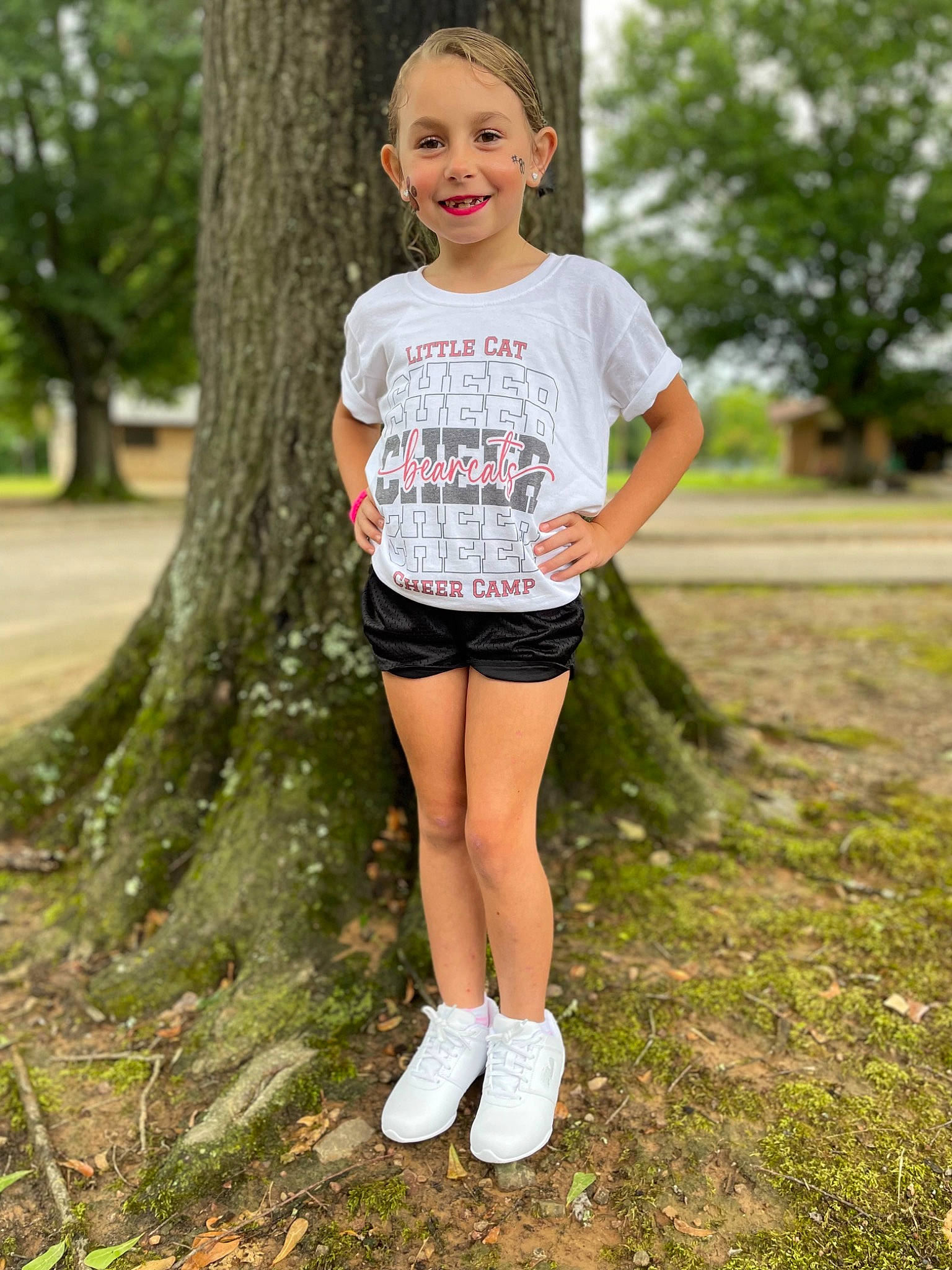 Sophi joined the competition — help win amazing prizes! blond, footwear, fun, grass, happy, human_leg, joy, knee, leg, leisure, people, people_in_nature, person, plant, recreation, shorts, smile, sneakers, summer, t_shirt