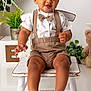 Dejai joined the competition — help win amazing prizes! baby, bow_tie, chair, child, clothing, curly_hair, cute, decor, flower, happy, indoor, plant, portrait, shorts, sitting, smiling, suspenders, teddy_bear, toddler, wooden_chair