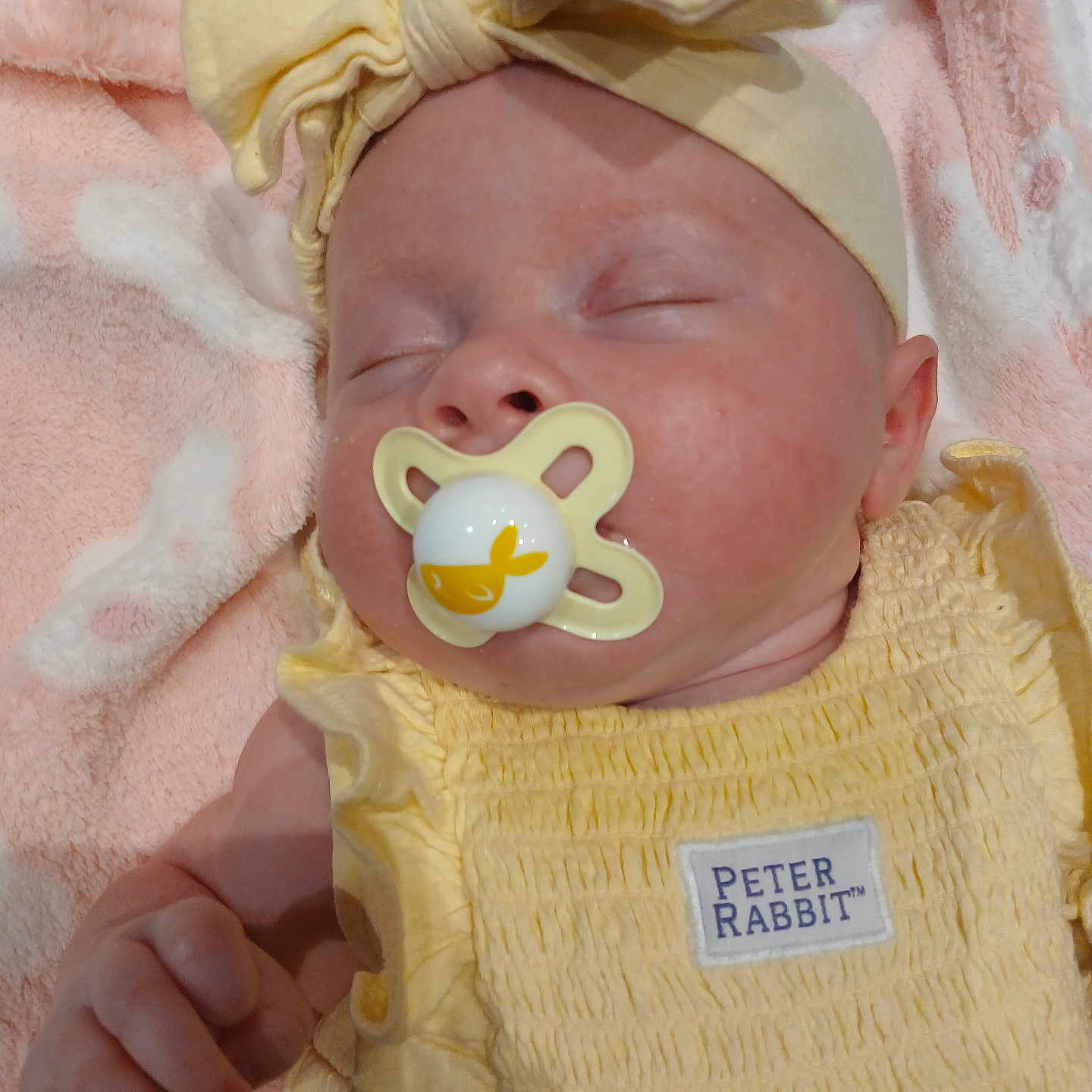 Tianna joined the competition — help win amazing prizes! baby, blanket, child, closeup, comfort, cute, face, hand, headband, indoors, infant, newborn, pacifier, peaceful, peter_rabbit_tag, portrait, resting, sleeping, soft_texture, yellow_clothing