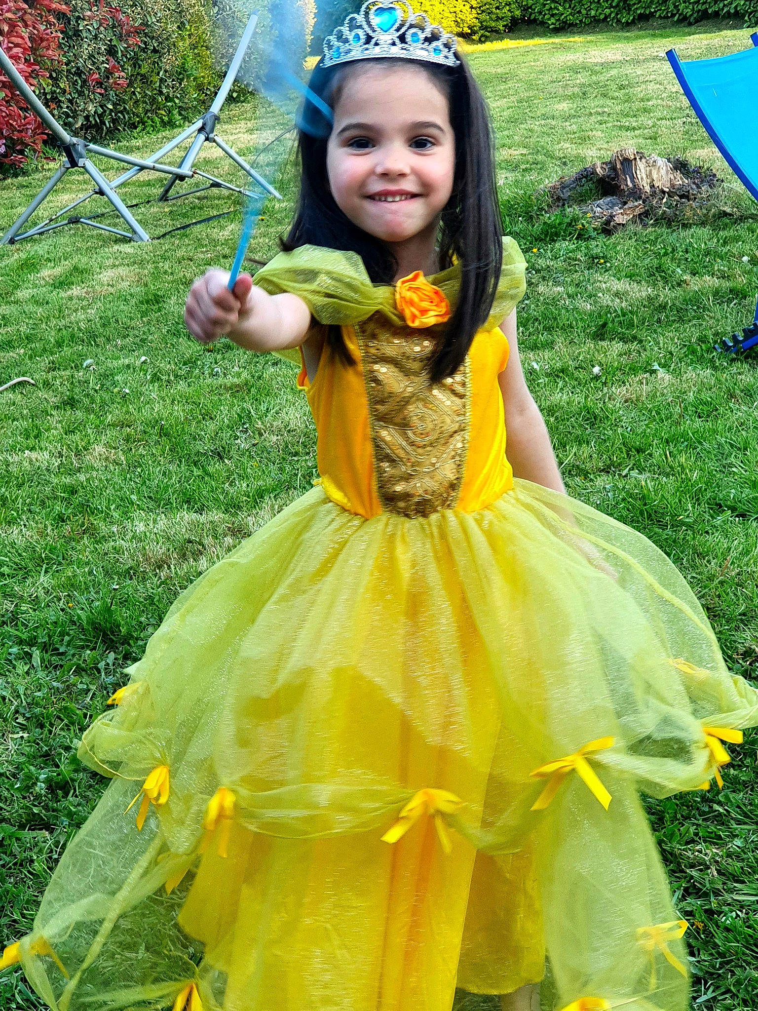 Helyna participe au concours pour gagner de l'argent avec cette photo : beauty, blue, child, dress, event, face, facial_expression, formal_wear, fun, gown, grass, green, hairstyle, happy, headwear, joy, people_in_nature, person, plant, recreation