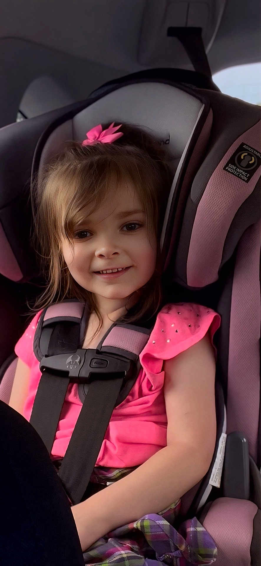 Vivienne joined the competition — help win amazing prizes! child, car_seat, pink_clothing, smiling, seat_belt, girl, hair_bow, plaid_skirt, child_safety, interior, vehicle, cute, happy, portrait, young_child, seat, car, child_in_car, secure, casual_clothing