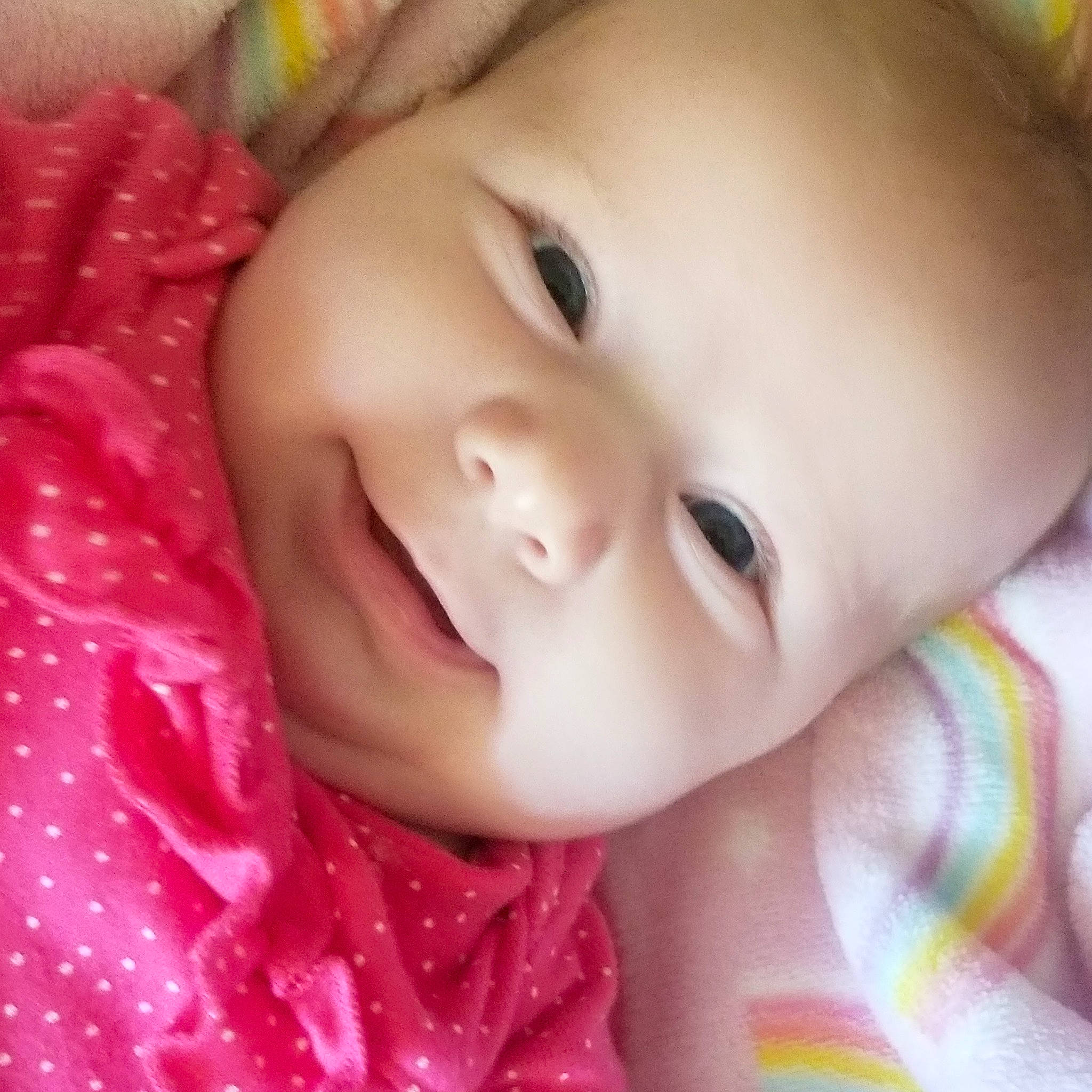 Brylee is registered to the contest to win money with this photo: baby, baby_toddler_clothing, cheek, child, chin, eyebrow, eyelash, face, facial_expression, finger, forehead, happy, iris, lip, mouth, nose, person, pink, skin, smile