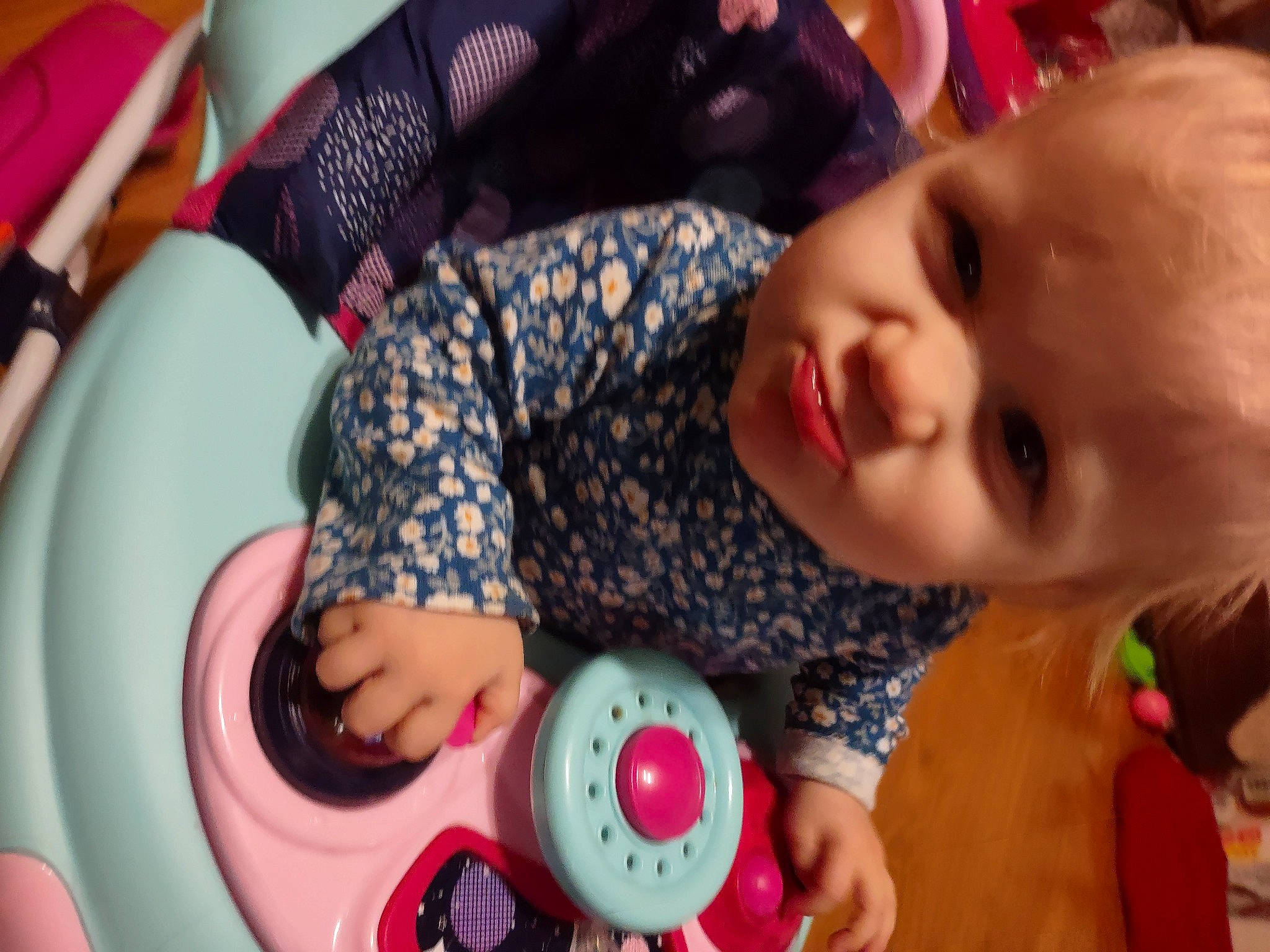 Brylee joined the competition — help win amazing prizes! arm, audio_equipment, baby, baby_playing_with_toys, baby_toddler_clothing, cheek, eye, facial_expression, fun, happy, iris, mouth, nose, person, pink, red, skin, snapshot, toddler, toy
