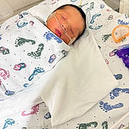 Kingsley joined the competition — help win amazing prizes! newborn, baby, swaddled, blanket, hospital, oxygen_tube, sleeping, bassinet, footprints, infant, medical, cute, child, healthcare, pediatric, resting, soft, peaceful, tiny, wrapped