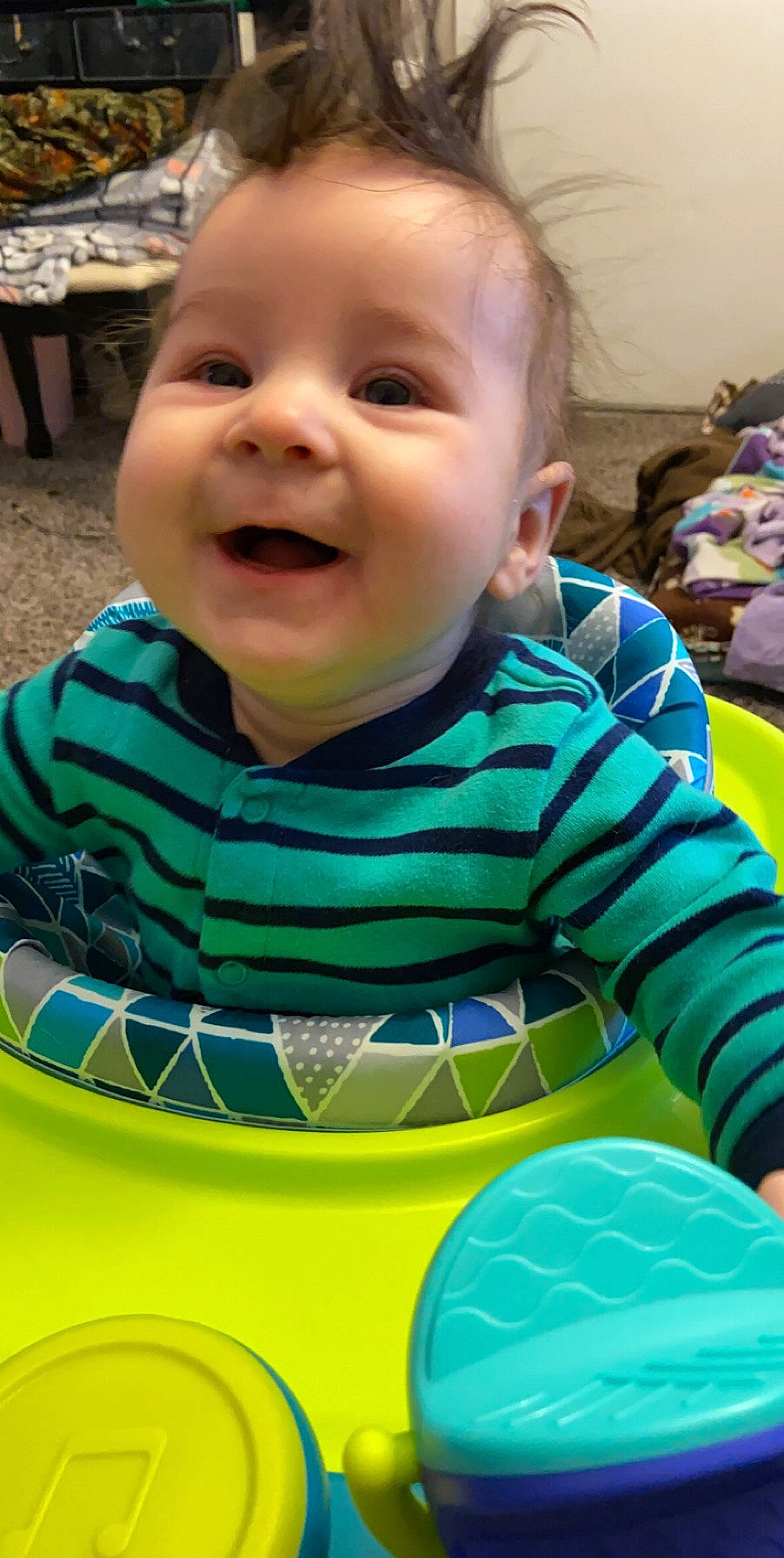 Link is registered to the contest to win money with this photo: baby, cheek, child, eye, face, facial_expression, fun, green, happy, head, laugh, leisure, mouth, person, play, skin, smile, toddler, tummy_time