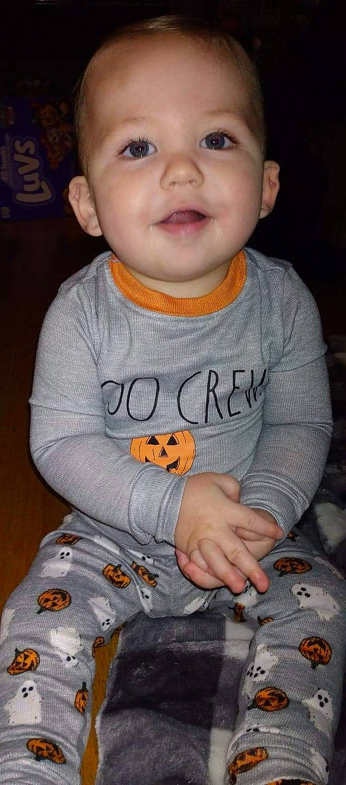 Emerson joined the competition — help win amazing prizes! arm, baby_toddler_clothing, blue, cheek, clothing, facial_expression, hairstyle, happy, head, human_body, mouth, nose, orange, organ, outerwear, person, skin, sleeve, smile, t_shirt