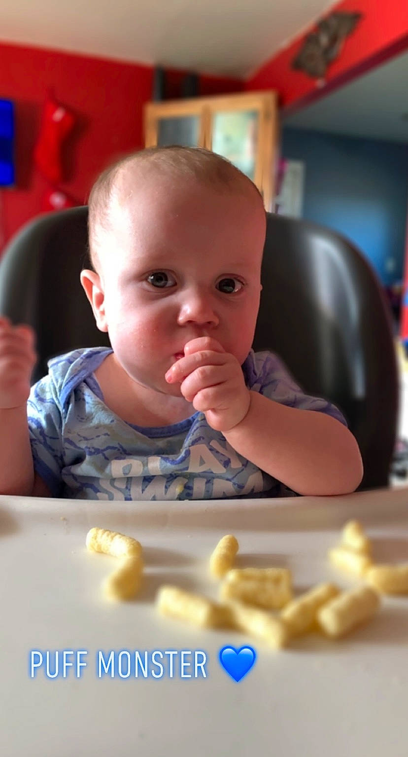 Greyson joined the competition — help win amazing prizes! baby, baby_toddler_clothing, chair, cheek, child, chin, finger, flooring, fun, happy, person, room, sitting, skin, sweetness, thumb, toddler