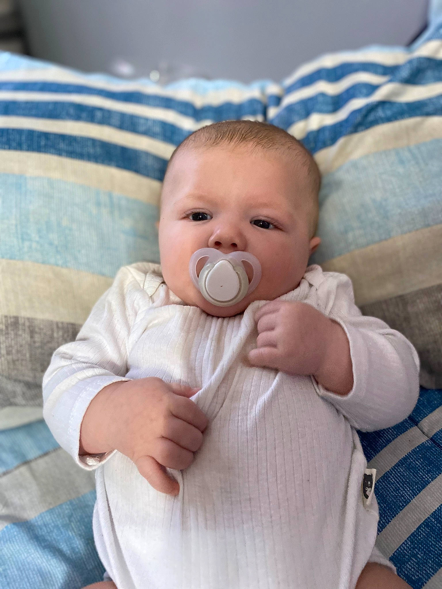 Ezekiel joined the competition — help win amazing prizes! baby, baby_products, baby_toddler_clothing, cheek, child, collar, comfort, eye, face, gesture, head, iris, linens, lip, nose, person, sitting, skin, sleeve, thumb