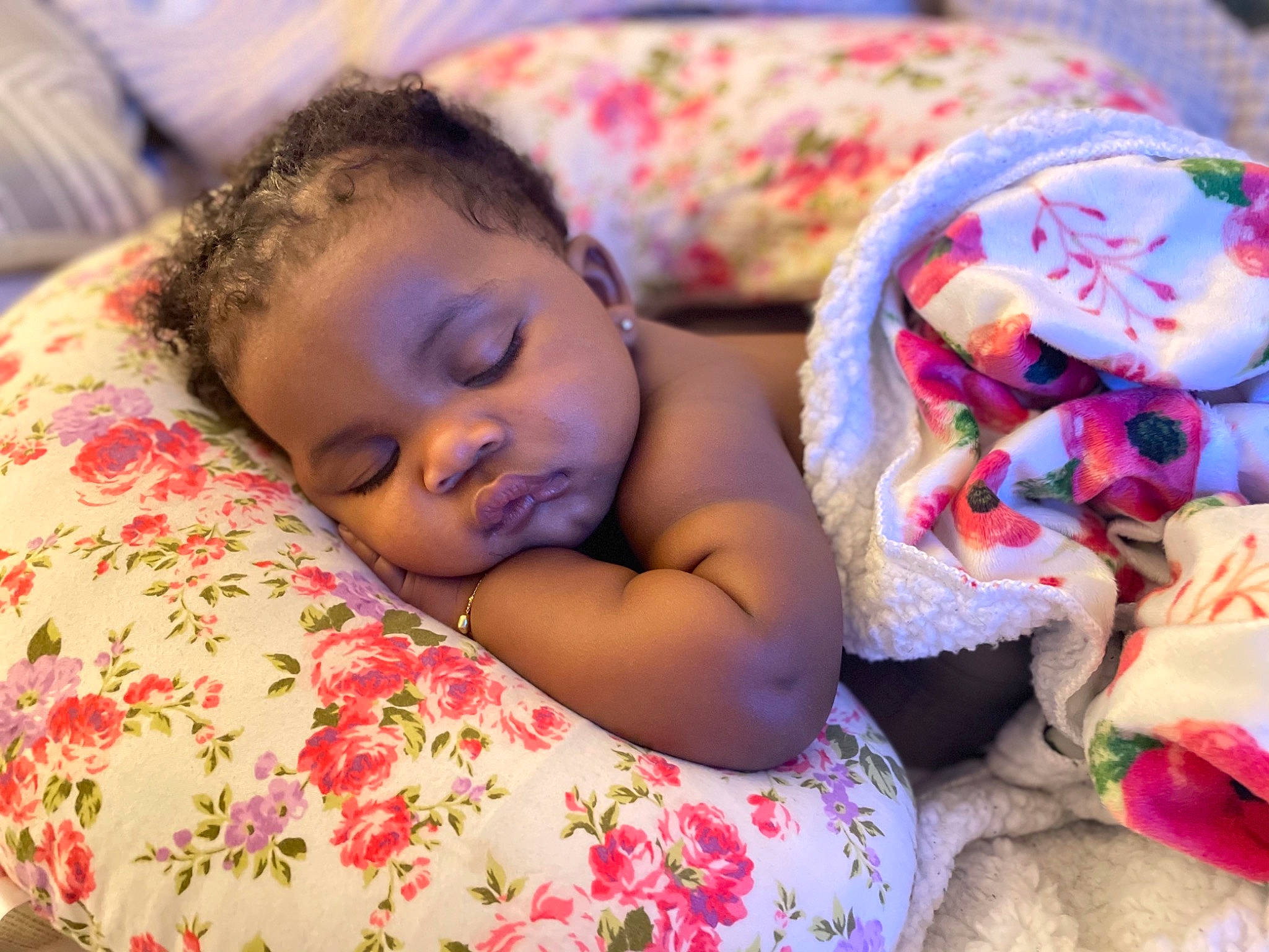 Shaliah joined the competition — help win amazing prizes! baby, baby_toddler_clothing, beauty, bedding, child, close_up, comfort, eye, face, facial_expression, grass, happy, head, iris, linens, lip, mammal, person, skin, textile