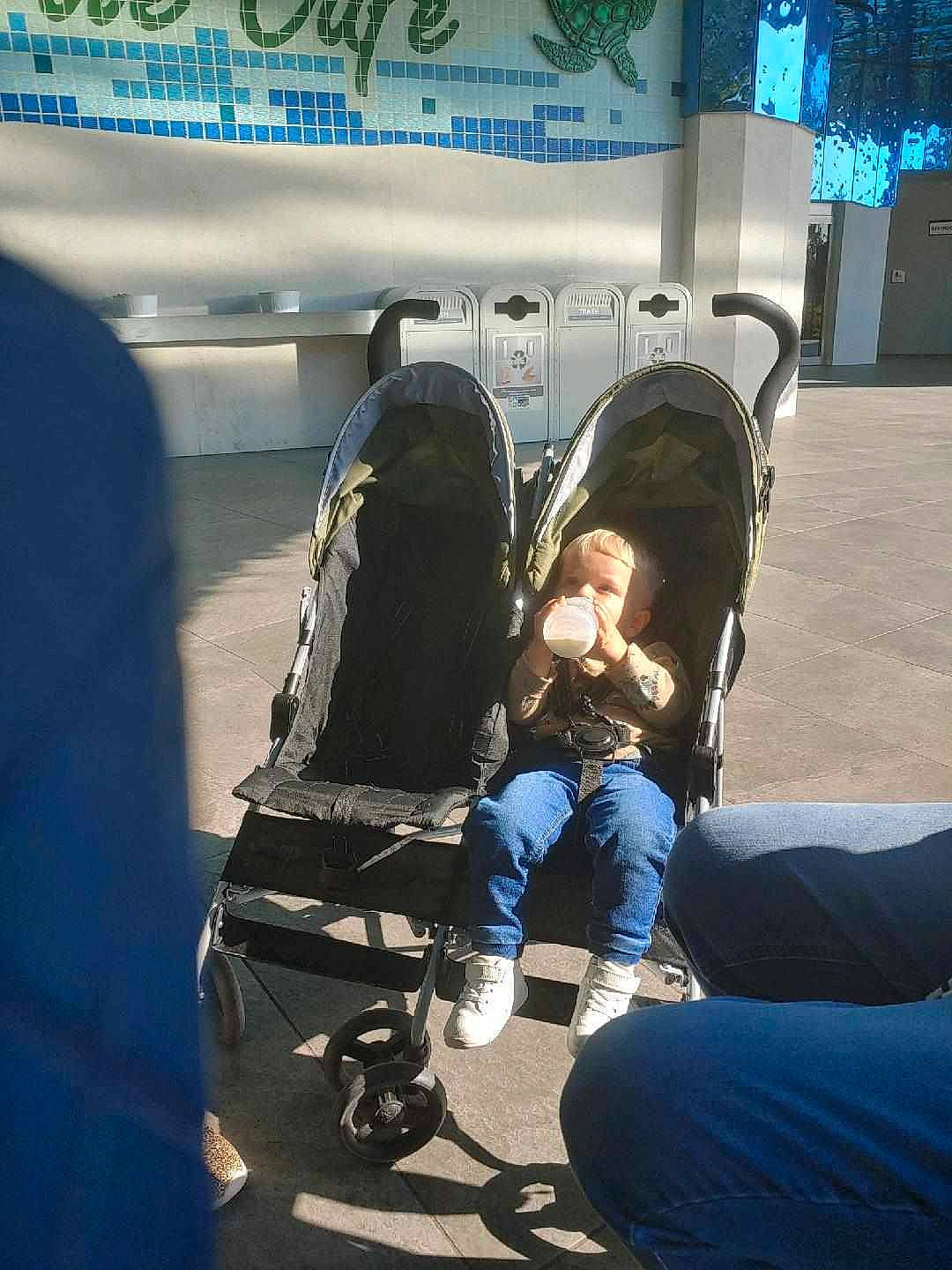 Elaine And Hubert is registered to the contest to win money with this photo: advertising, aerospace_engineering, automotive_design, automotive_tire, automotive_wheel_system, baby_products, bag, city, comfort, electric_blue, fun, jacket, leisure, luggage_and_bags, luxury_vehicle, motor_vehicle, person, personal_protective_equipment, recreation, sitting