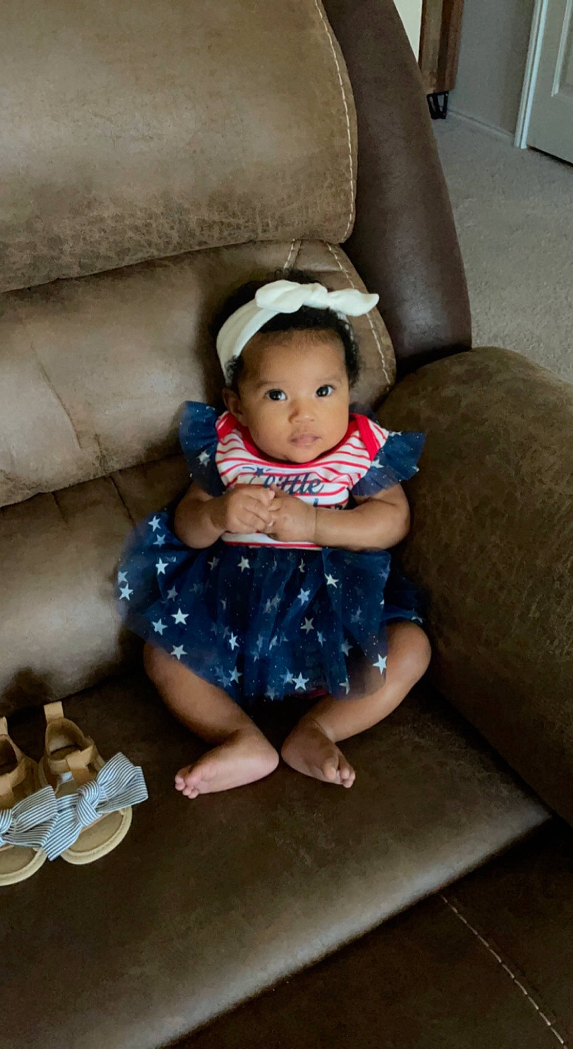 Bryleigh joined the competition — help win amazing prizes! baby, baby_toddler_clothing, child, comfort, couch, eye, floor, flooring, fun, hat, head, human_leg, lap, leg, pattern, person, purple, shoe, sitting, toddler