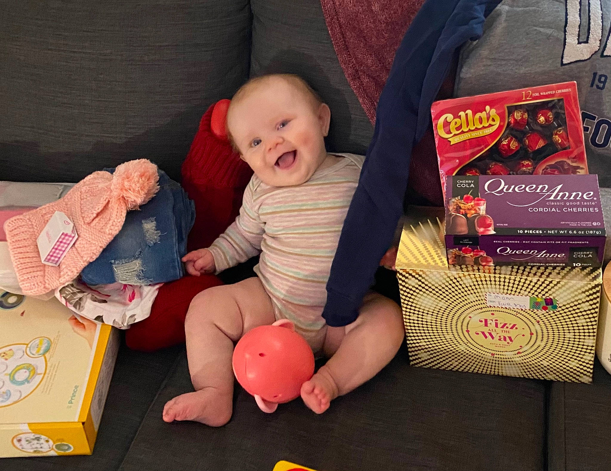 Olivia joined the competition — help win amazing prizes! baby, baby_products, baby_toddler_clothing, carmine, child, comfort, flooring, foot, lap, leg, person, pink, play, product, publication, room, sitting, textile, thigh, toddler